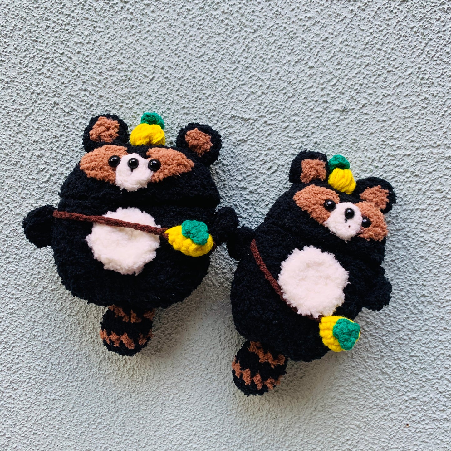 The Raccoon Family Crochet AirPods Cases