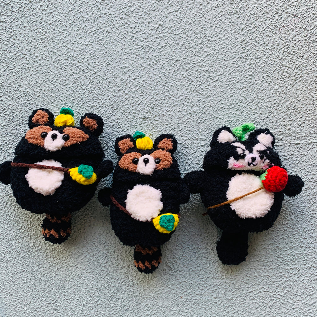 The Raccoon Family Crochet AirPods Cases