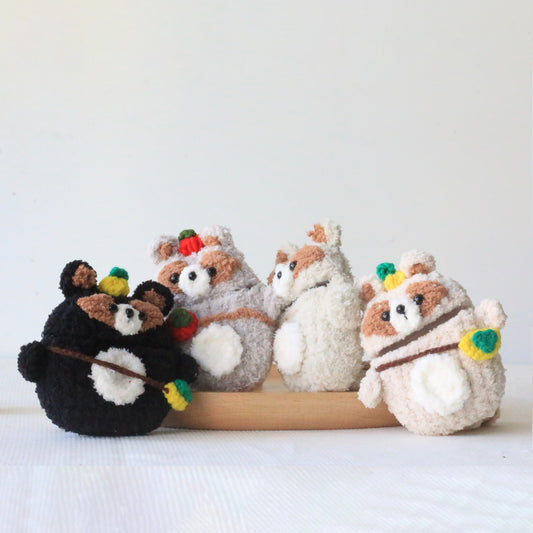 The Raccoon Family Crochet AirPods Cases